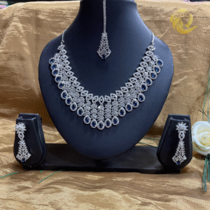 Varshace Fancy Rhodium Plated Blue AD Stone Collar Bone Necklace Set With Earring and Maangtika |Jewellery Set for Women